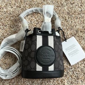 Dempsey drawstring backpack in signature jacquard with stripe and coach patch